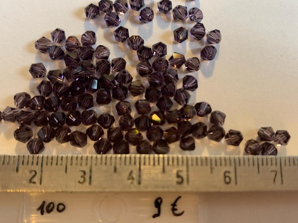 100 Swarovski tolletjes amethist, Ophalen of Verzenden, Nieuw, Kraal