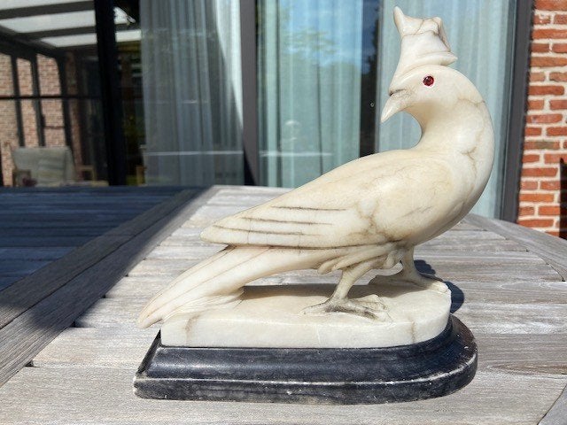 marmeren vogel, Enlèvement