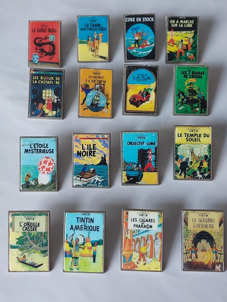Tintin lot de 16 pin's sur les albums Tintin, Enlèvement ou Envoi, Tintin