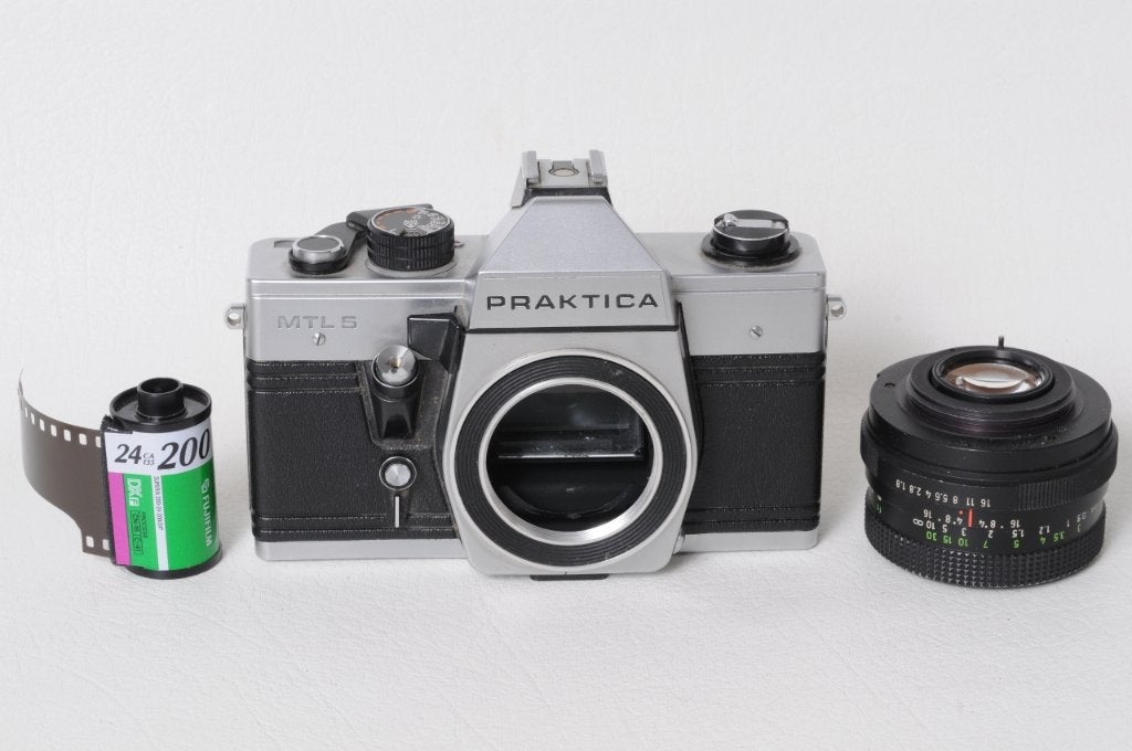Praktica MTL 5 + Objectif 50 mm 1:1,8 Pentacon + l’étui., Enlèvement ou Envoi, Comme neuf, Reflex miroir
