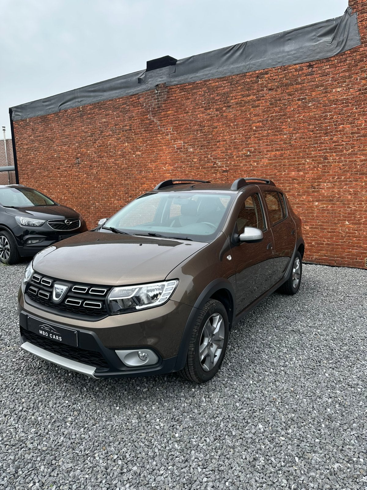 Dacia Sandero Stepway 0.9 TCe| CRUISE, NAVI, CAMERA,.., Auto's, Dacia, Voorwielaandrijving, 898 cc, Stof, Bruin