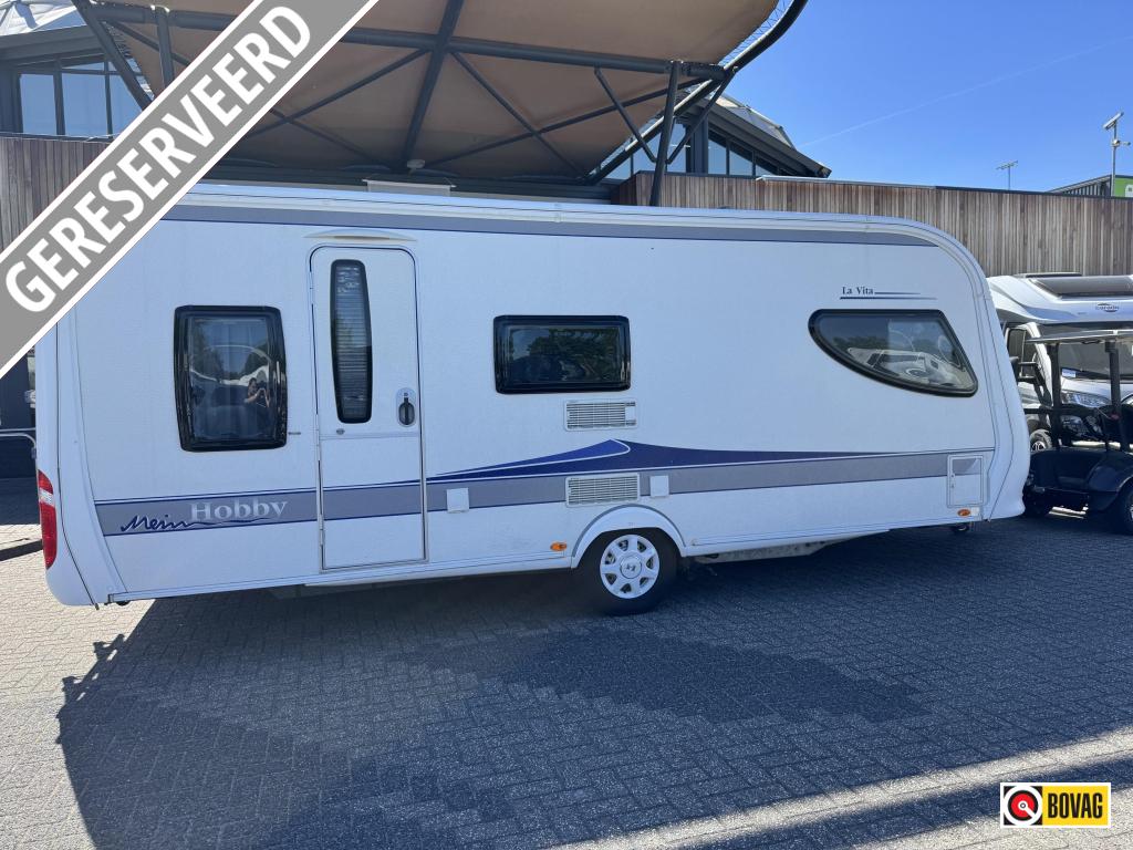 Hobby La Vita 560 KMFE 2010 MOVER + NIEUWE TENT!, Caravans en Kamperen, Rondzit, Schokbreker, 5 tot 6 meter, Tot en met 6