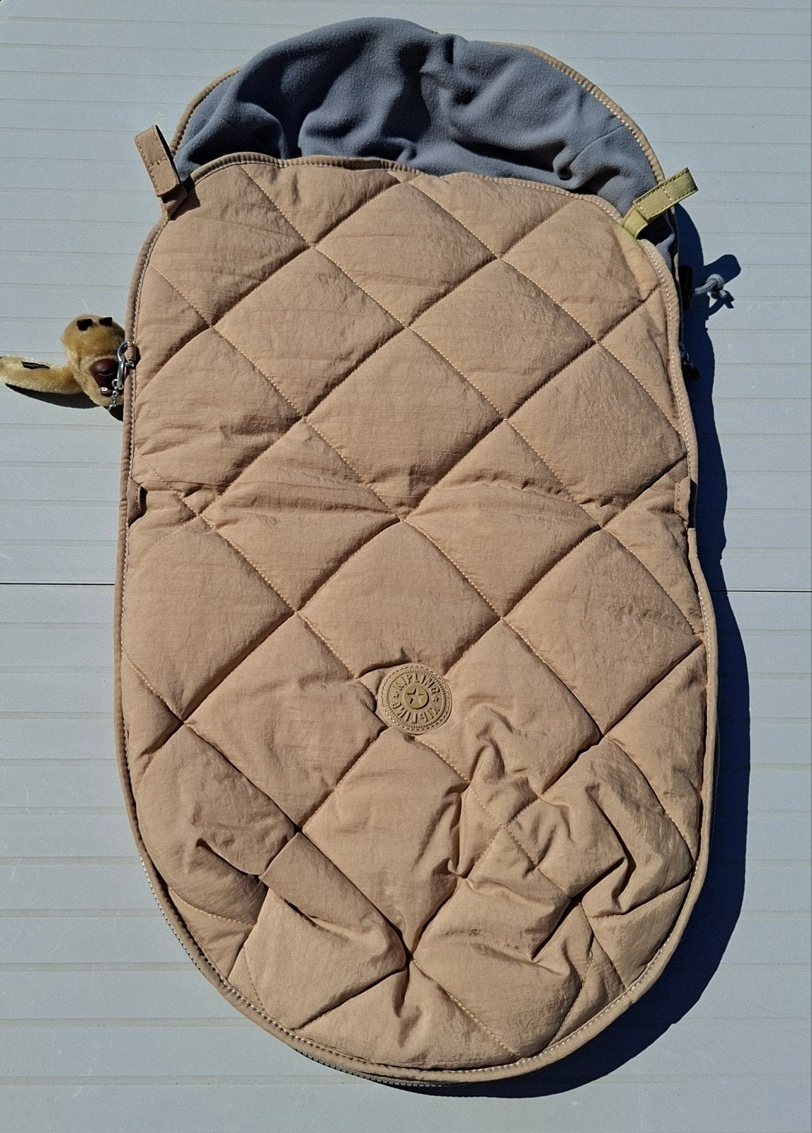 Chancelière Kipling universelle beige matelassée, Enlèvement