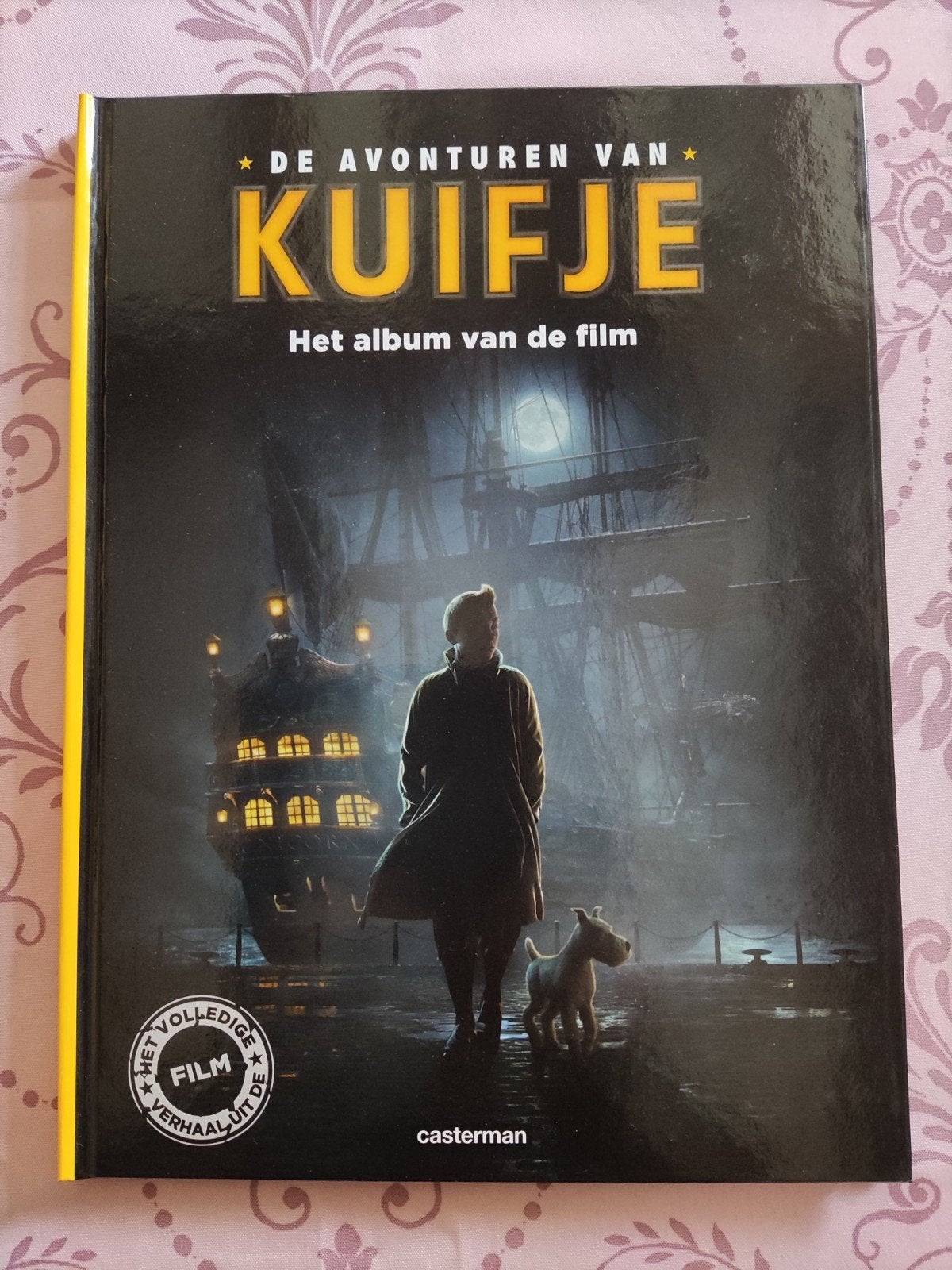 De avonturen van Kuifje. Het album van de film, Boeken, Ophalen