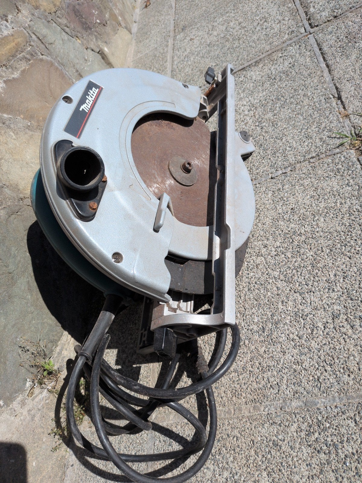 Zaagmachine Makita, Ophalen