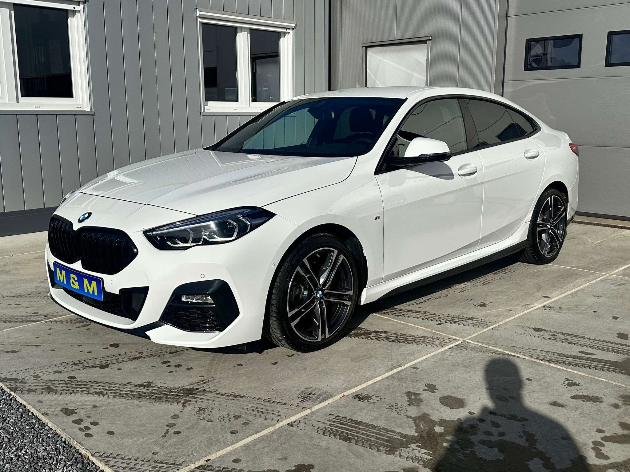BMW 218 Gran Coupé 218iA * M-Pakket * 12M Garantie *, Auto's, Automaat, Gebruikt, Zwart, Wit
