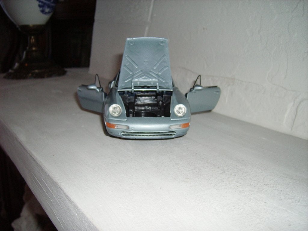 MAISTO PORSCHE CABRIO/ CARRERA 1994, Hobby en Vrije tijd, Ophalen of Verzenden, Zo goed als nieuw, Auto, Maisto