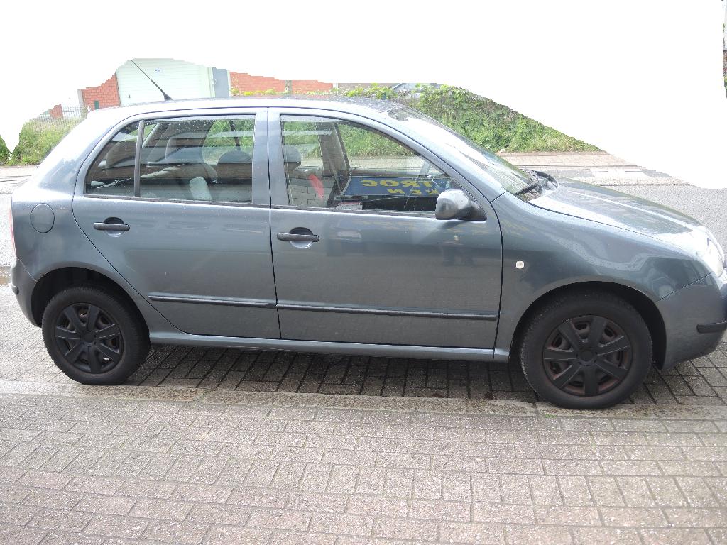 Skoda fabia 1.2 benzine met airco, Auto's, Voorwielaandrijving, Stof, Zwart, Multifunctioneel stuurwiel