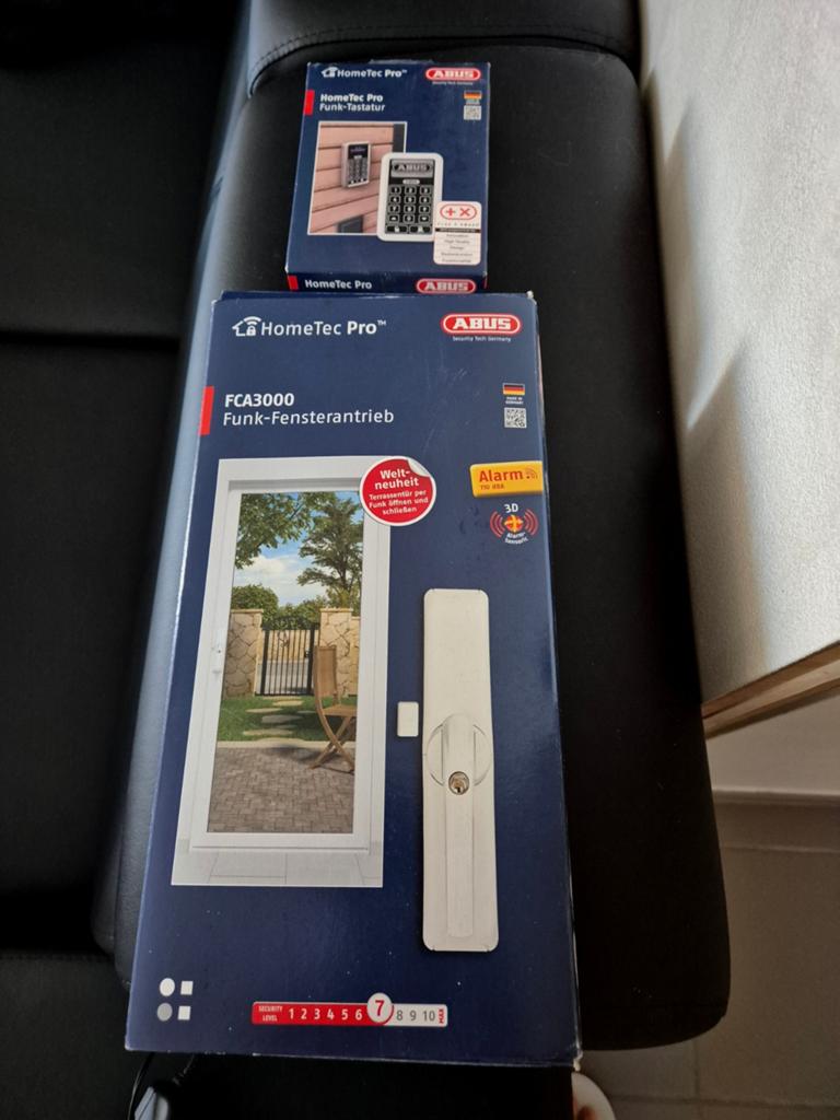HomeTec Pro  draadloze raamaandrijving ABUS  (nieuwstaat), Doe-het-zelf en Bouw, Alarmsystemen, Ophalen of Verzenden, Zo goed als nieuw