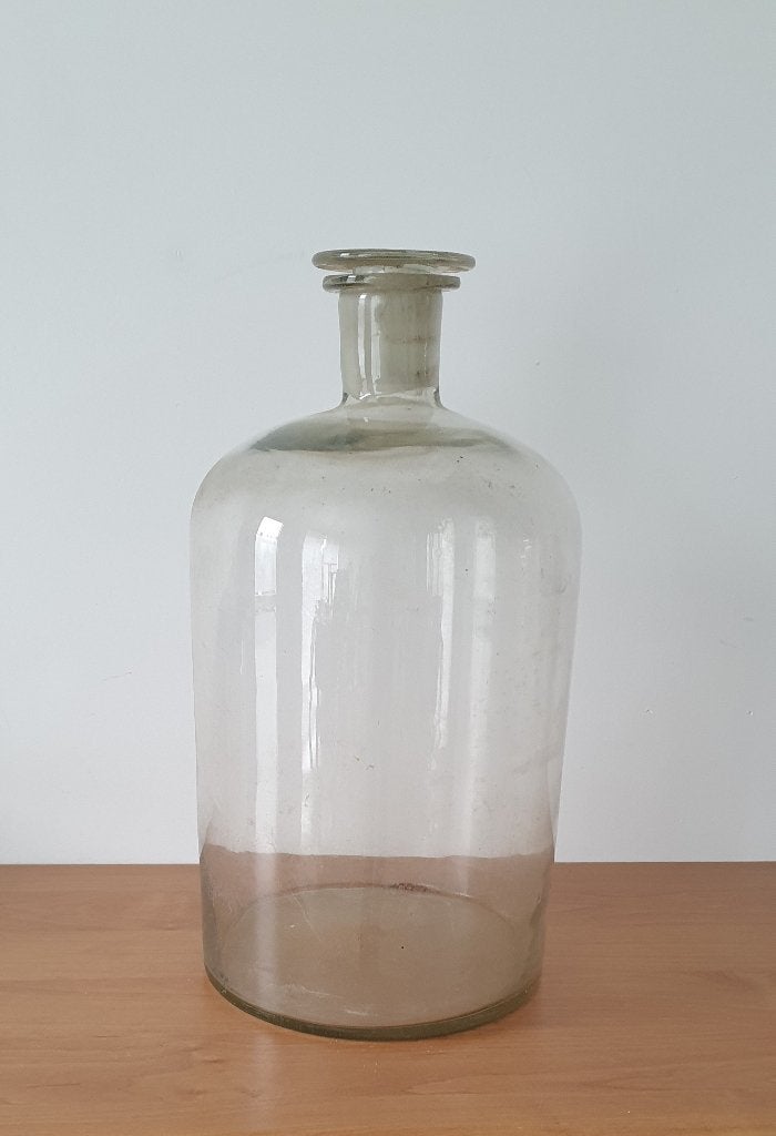 Glazen apothekers fles, Ophalen