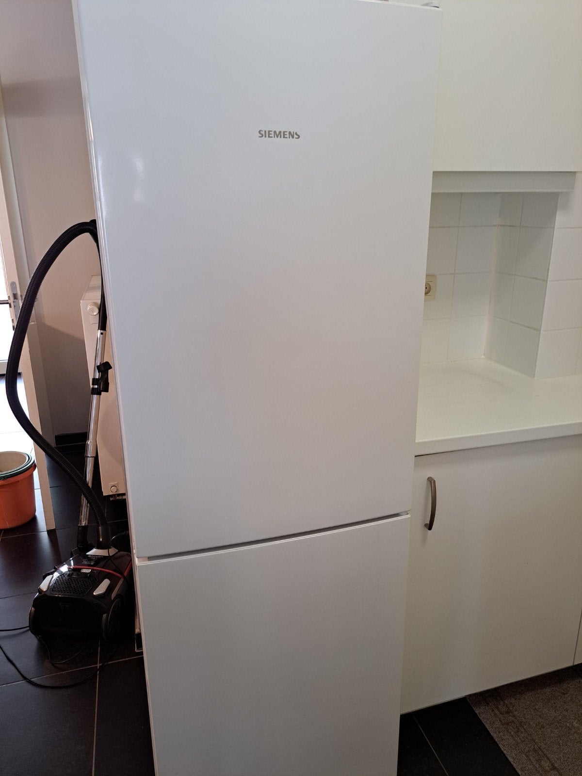 Frigo met diepvries, Ophalen