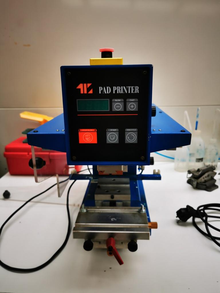Tampondruk machine, Ophalen