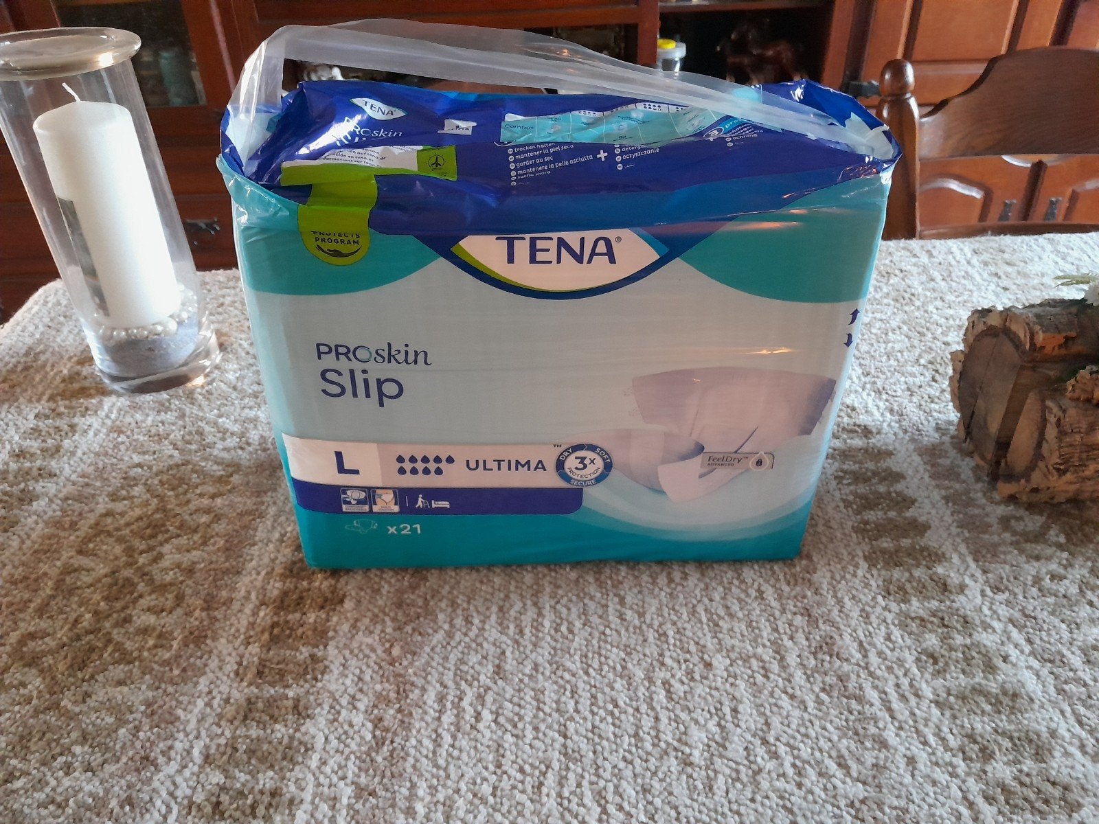 tena slip ultima L nog new, Ophalen