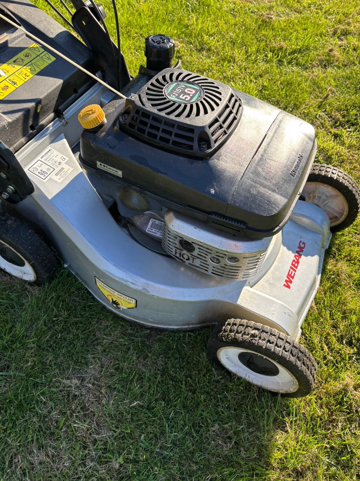 Grasmaaier weibang met kawasaki moter, Ophalen