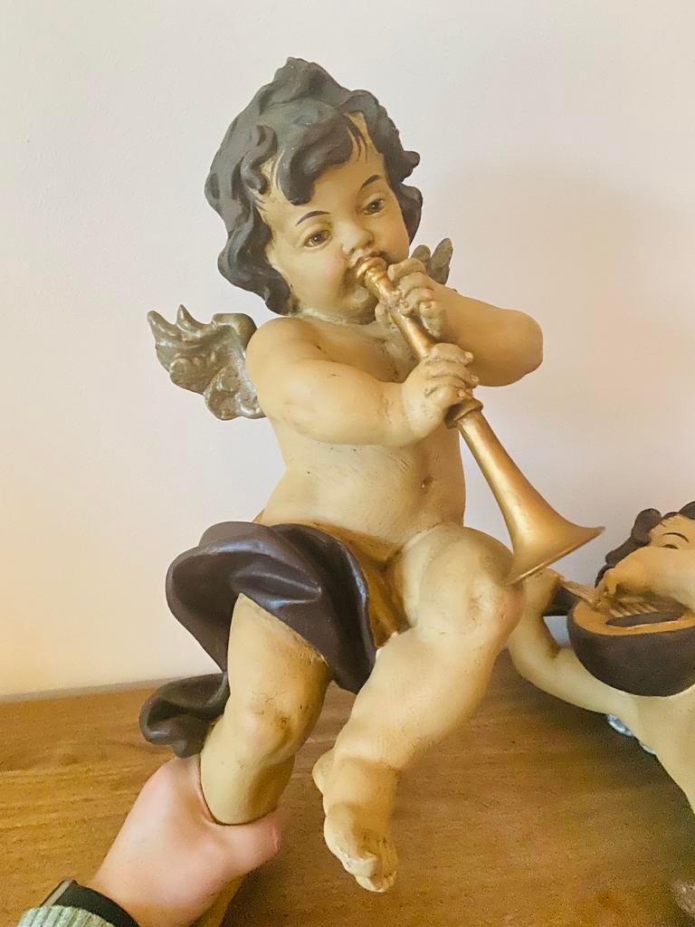 Antieke wandengelen, Ophalen