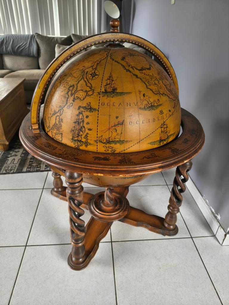 Antieke globe bar, Ophalen