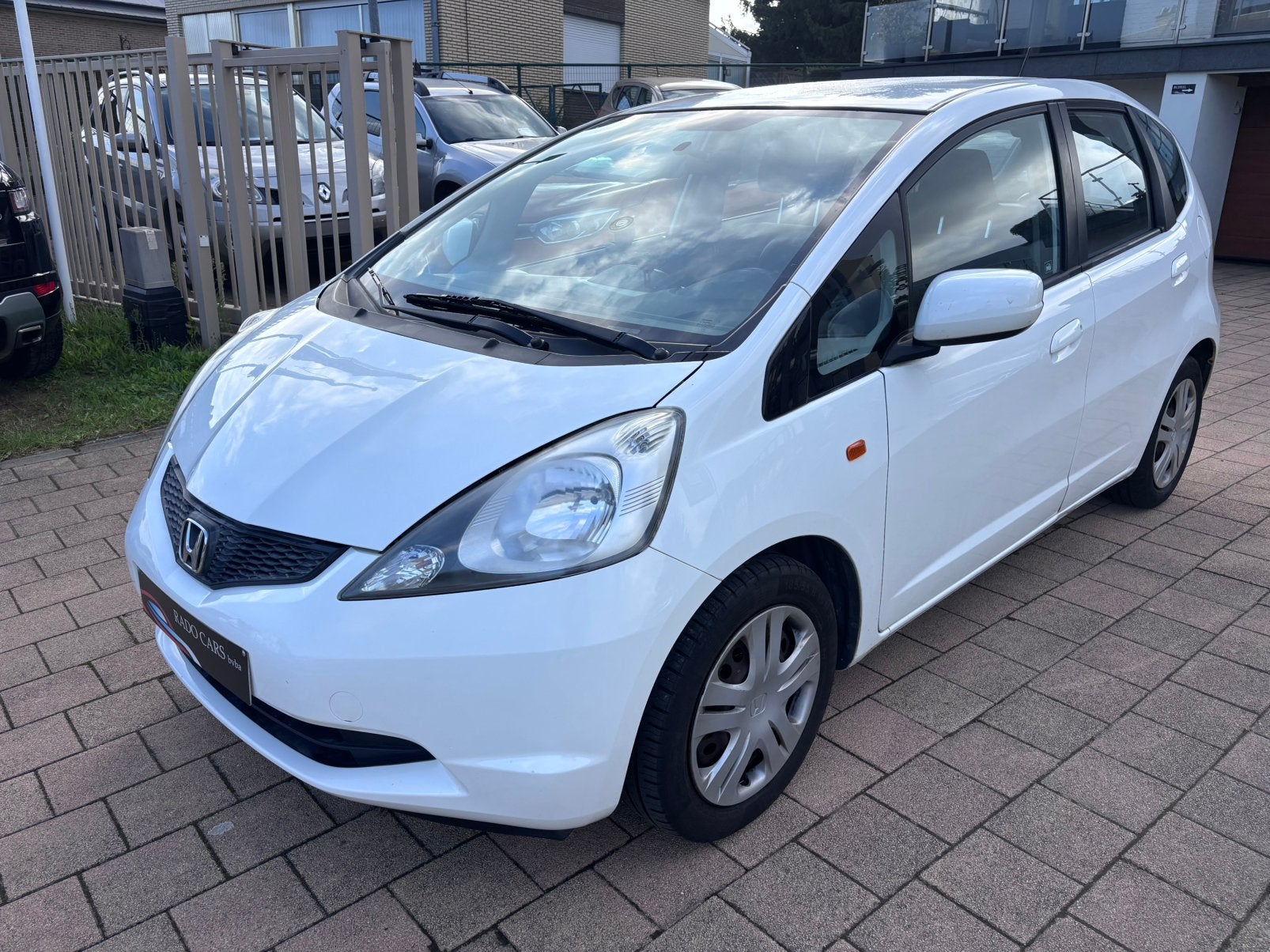Honda jazz benzine van 2009, Auto's, Honda, Wit, Bedrijf, 5 deurs, Airbags