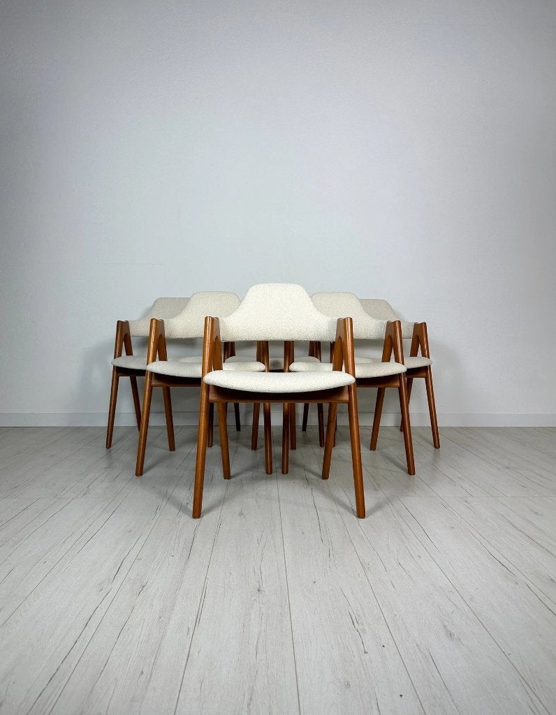 6 Kai Kristiansen Compass teak eetkamerstoelen crème bouclé, Ophalen