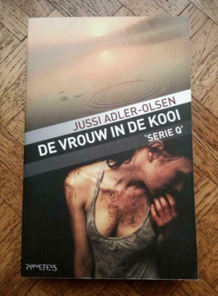 Jussi Adler-Olsen: De vrouw in de kooi, Ophalen of Verzenden, Gelezen