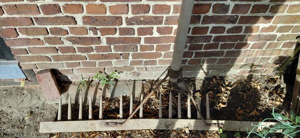 Houten hark weg door verhuis, Ophalen
