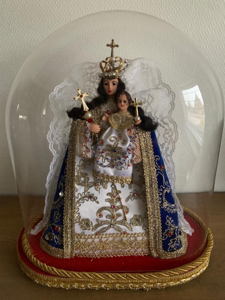 Maria beeld met kind onder glazen stolp, Ophalen