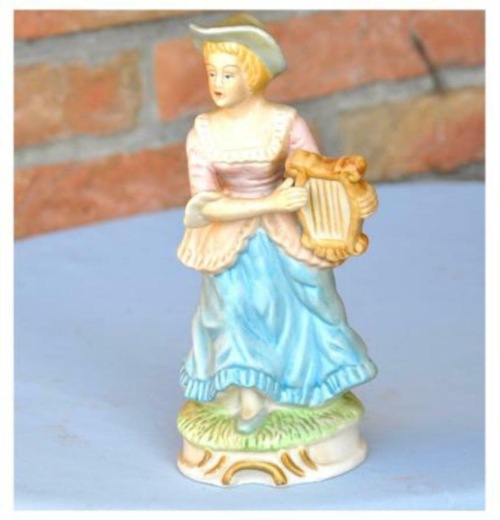 §statuette joueuse de lyre, Enlèvement ou Envoi