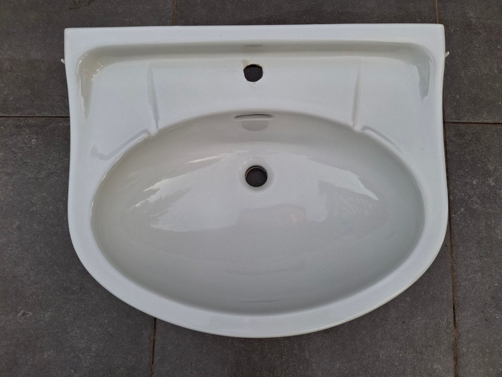 Wasbak, Ophalen