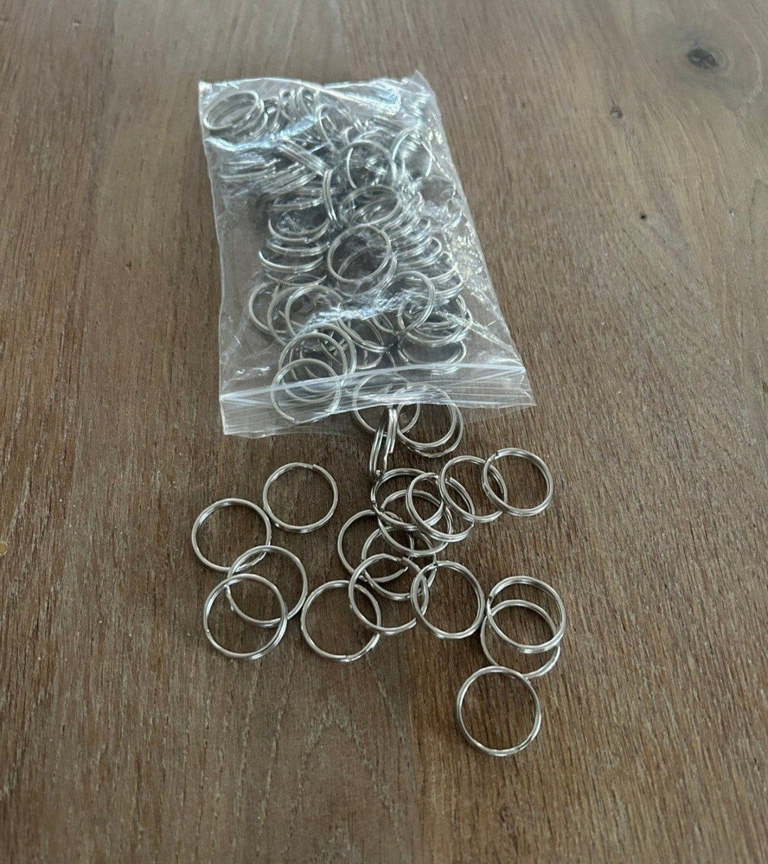 partij sleutelhanger ringen 25000st nieuw zakjes a 100st, Diversen, Ophalen, Nieuw