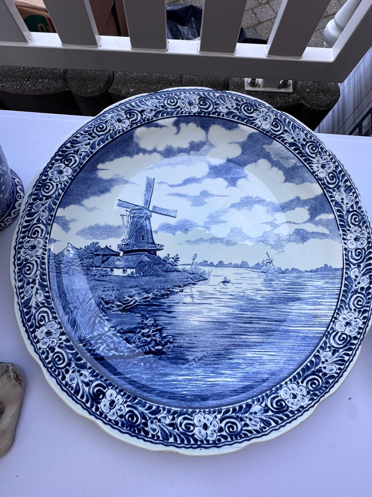 Wandbord delfts blauw, Ophalen