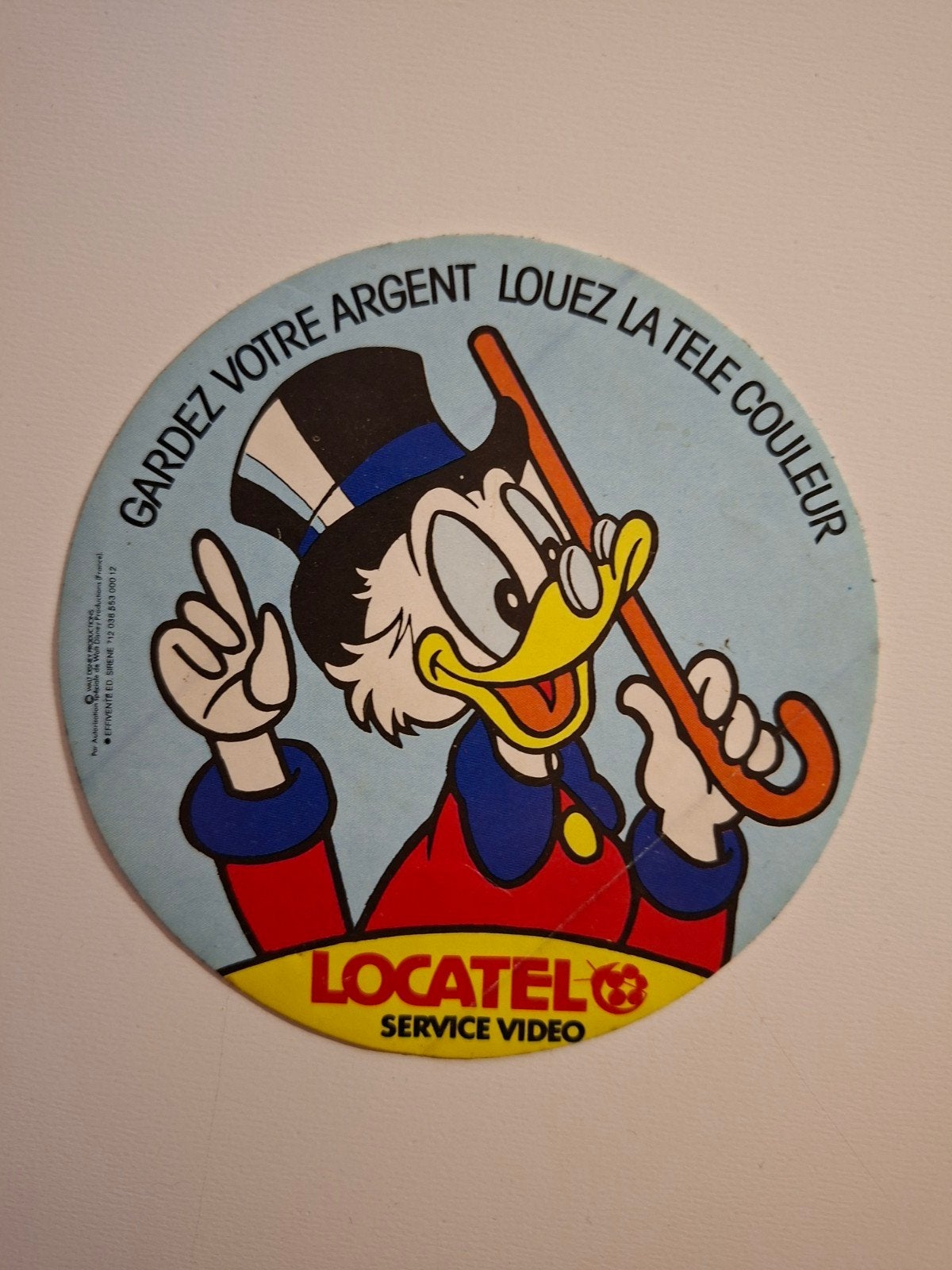 sticker Disney Oom Dagobert Locatel, Ophalen of Verzenden, Zo goed als nieuw, Film, Tv of Omroep