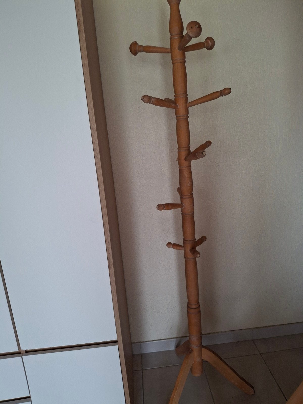 Houten kapstok, Ophalen