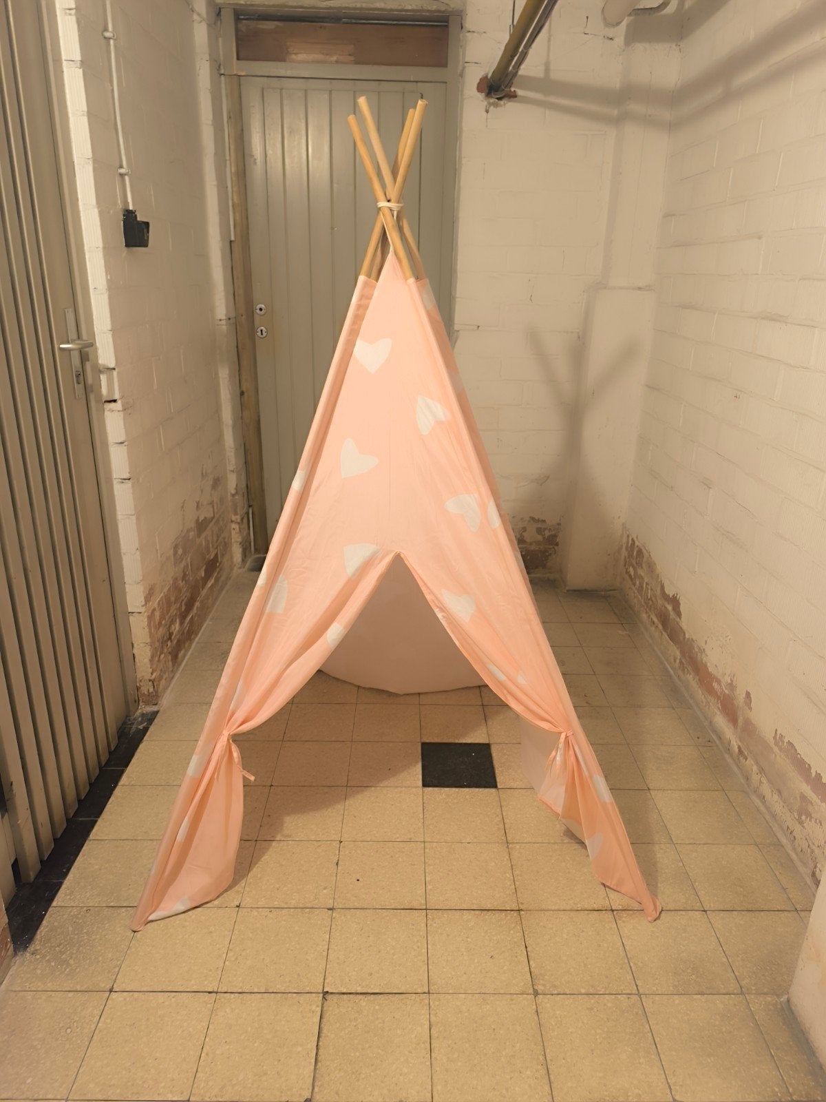 Speel tipi tent, Ophalen