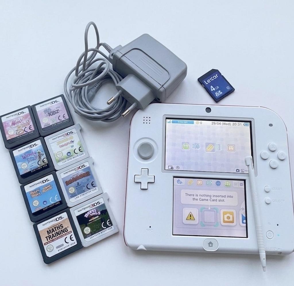 Nintendo 2DS Wit/Rood + 8 Games + Lader, Ophalen of Verzenden, Zo goed als nieuw, Rood, 2DS