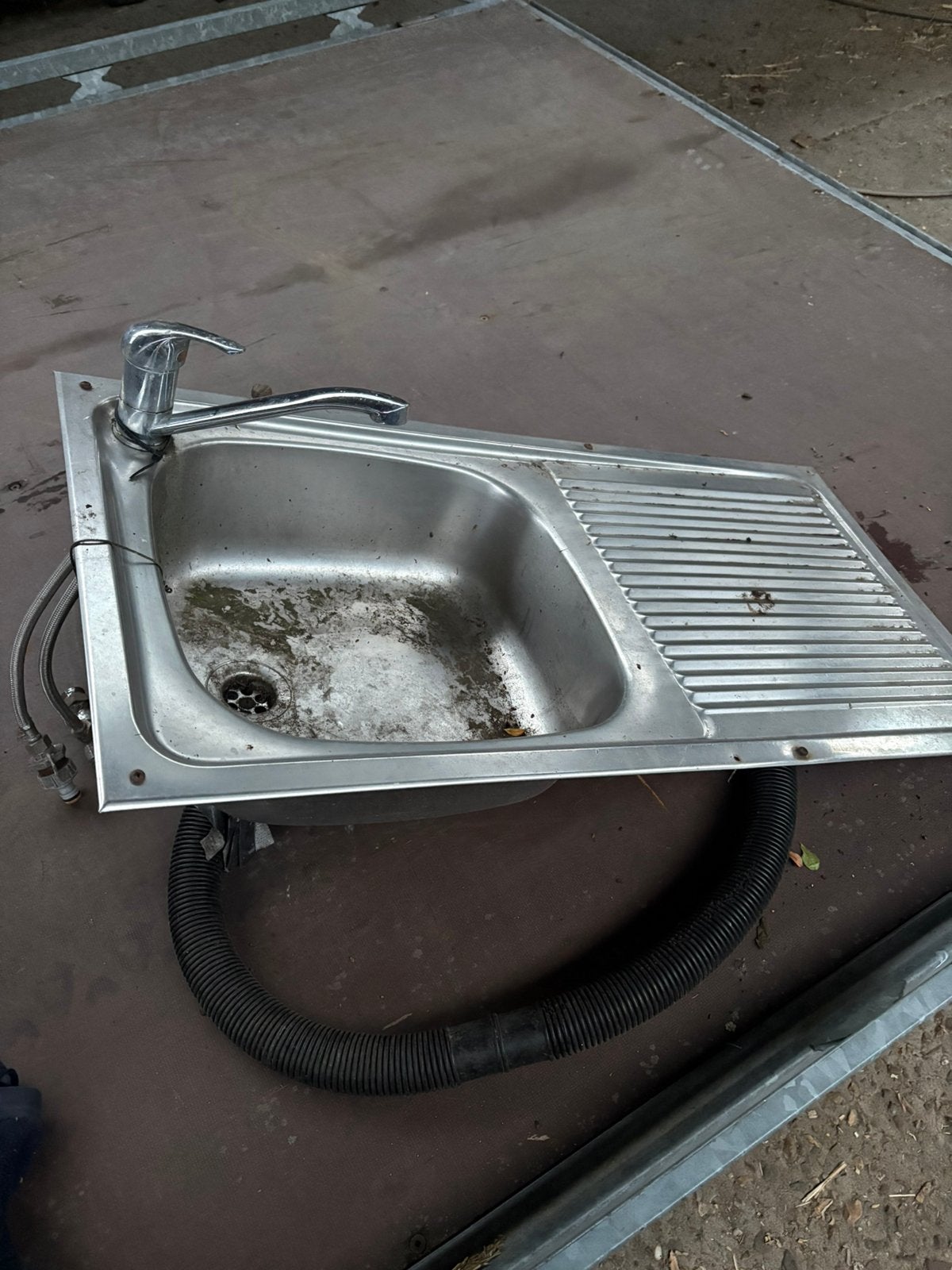 Spoelbak met kraan, Ophalen