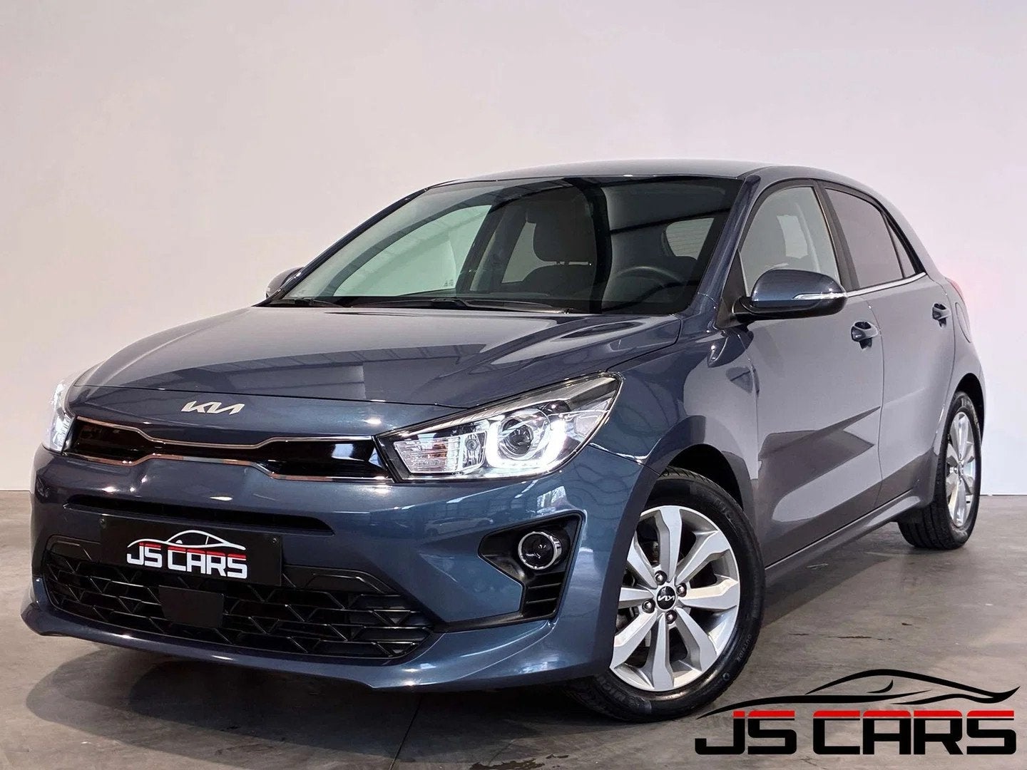 Kia Rio 1.2i Pulse 1ERPRO-GPS-CARPLAY-CAMERA-JANTES16-PDC, Auto's, Stof, Gebruikt, 4 cilinders, Blauw