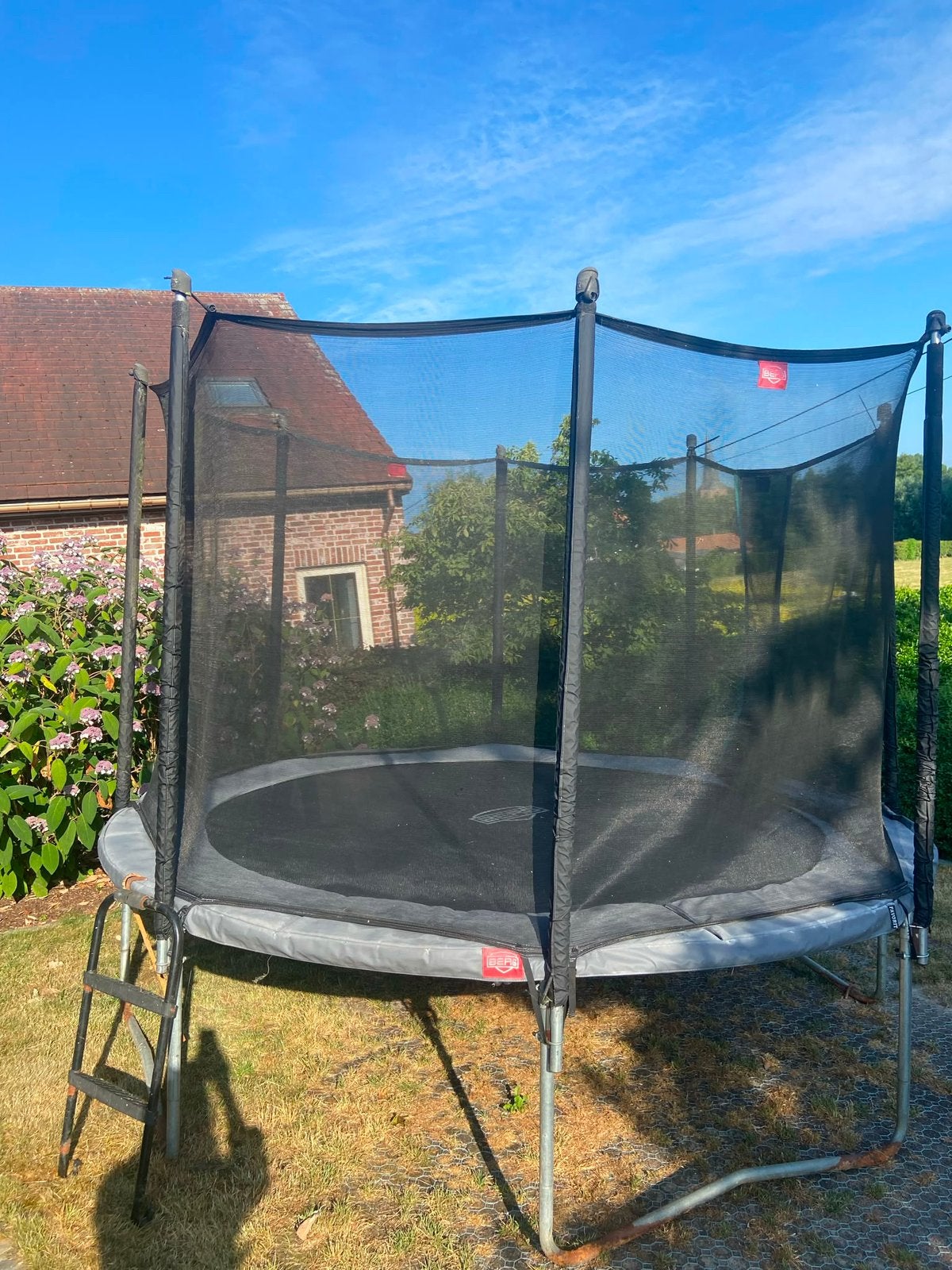 Berg trampoline Favorit met safetynet comfort, Enlèvement, Comme neuf