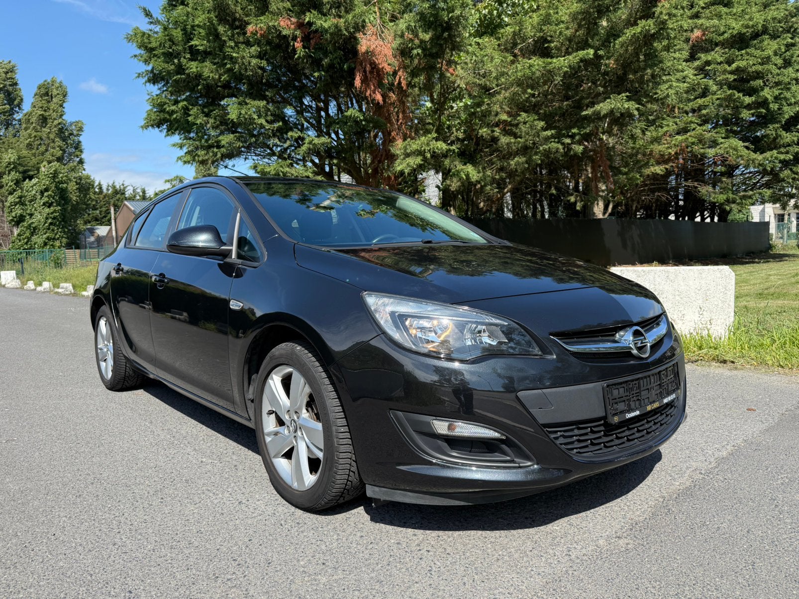 Opel Astra | 2012 | Benzine | 75.400Km | Airco | Garantie |, Auto's, Opel, Dealer onderhouden, Stof, Zwart, Zwart