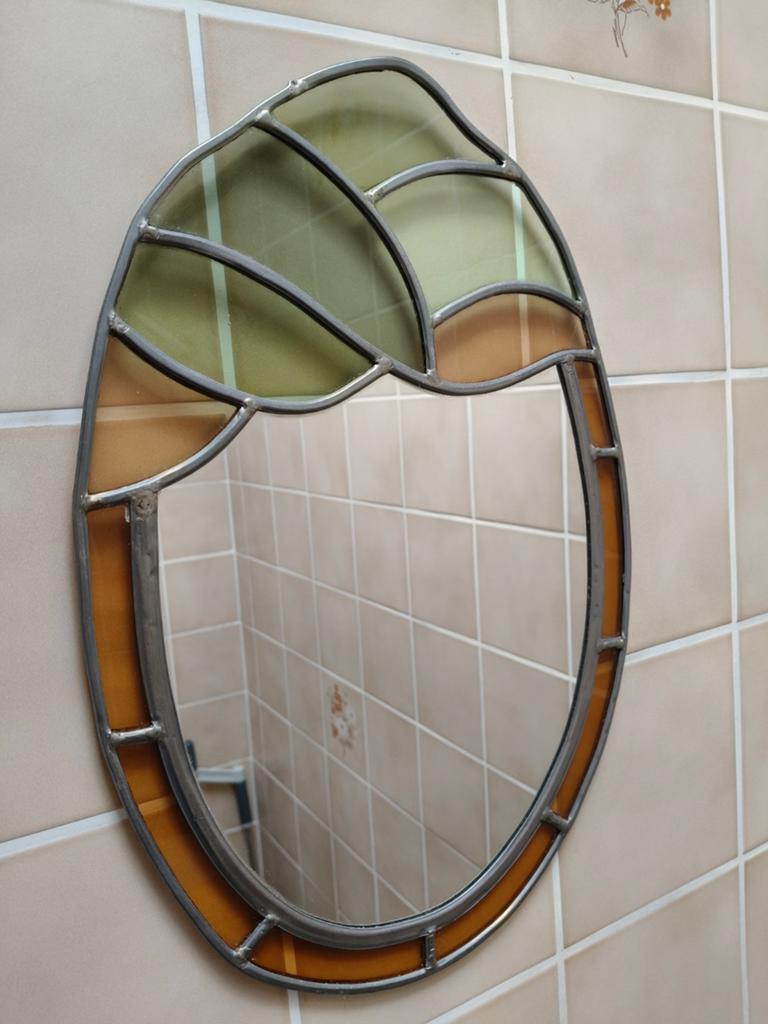 Spiegel met glas-in-lood, Ophalen