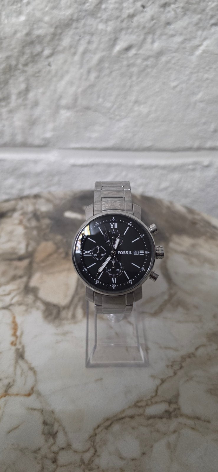 Fossil Horloge, Enlèvement