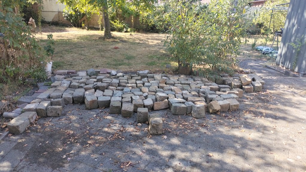 7 meter echte kinderkopjes gratis, Tuin en Terras, Ophalen, Zo goed als nieuw, Grijs, Kei