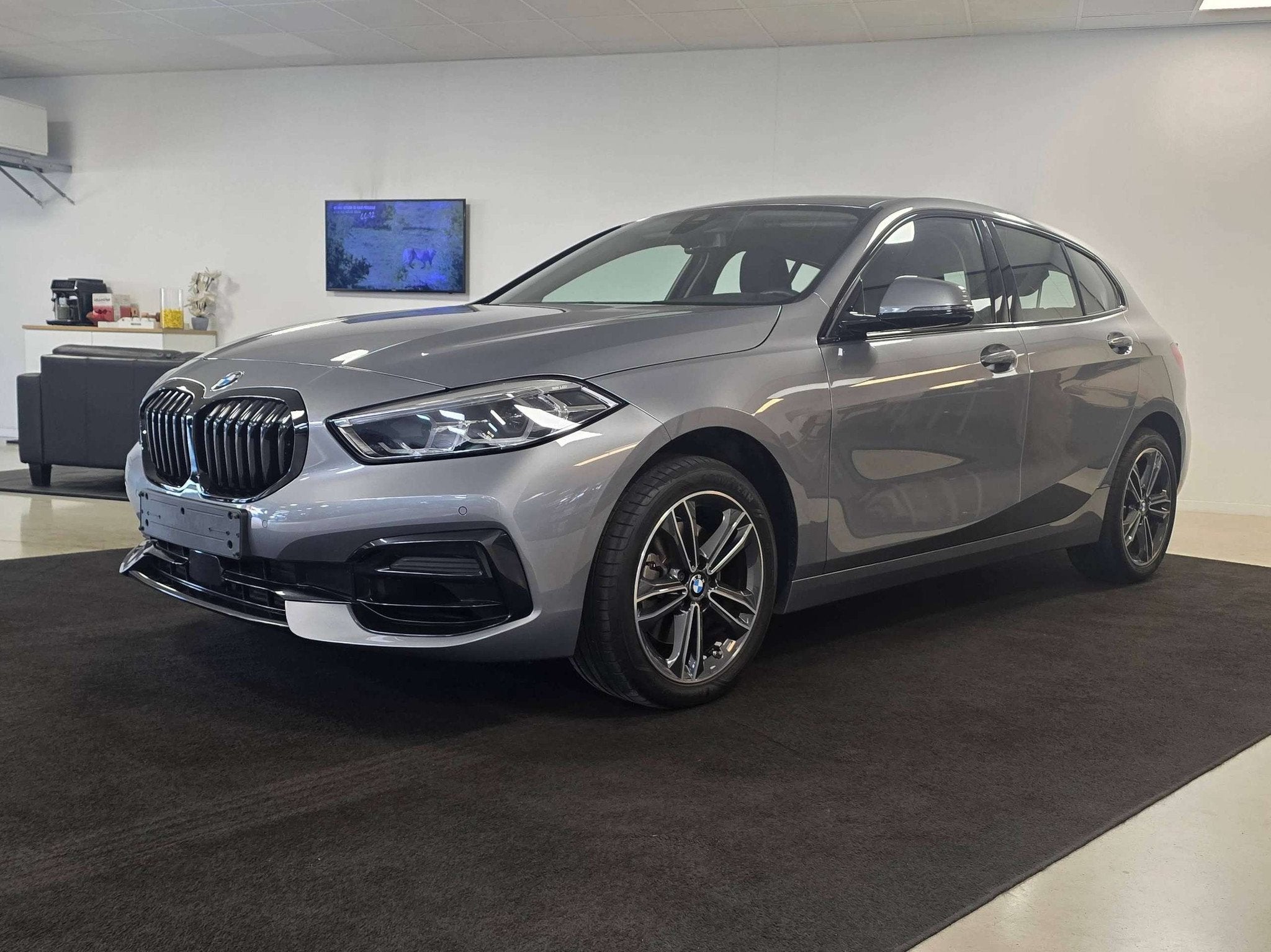 BMW 1 Serie 116 116iA OPF Sport Edition 3jaar BMW garantie, Auto's, 1 Reeks, Gebruikt, Zwart, 5 deurs