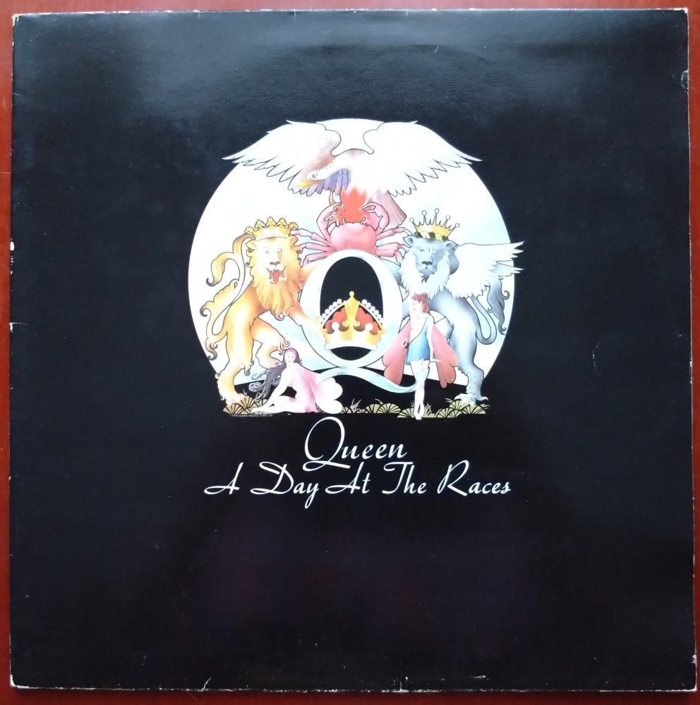 Vinyl lp Queen - A day at the races, Cd's en Dvd's, LP, Gebruikt, Verzenden, Inclusief boekje