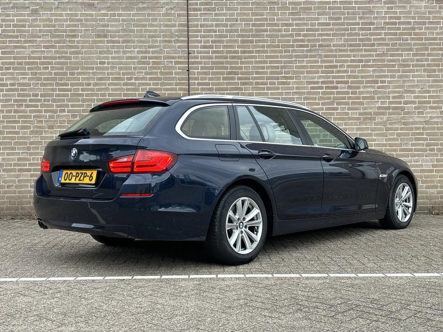 BMW 520 5-serie Touring 520d High Executive | Leder | Climat, Autos, 139 g/km, Entreprise, Noir, Automatique