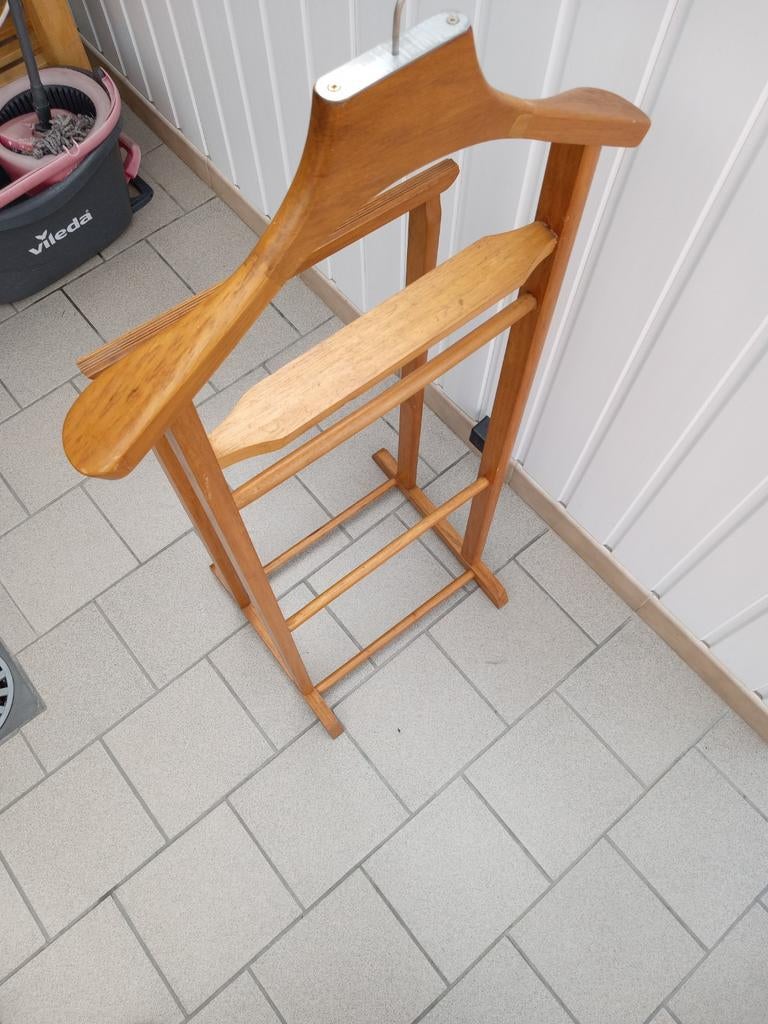 Perchoir pour vêtements, Ophalen