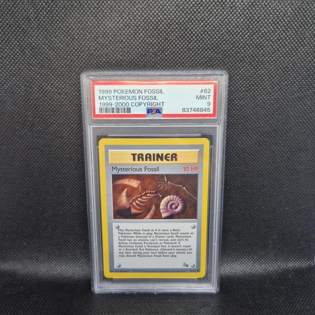 Mysterious Fossil 1999-2000 Copyright Fossil PSA 9, Ophalen of Verzenden