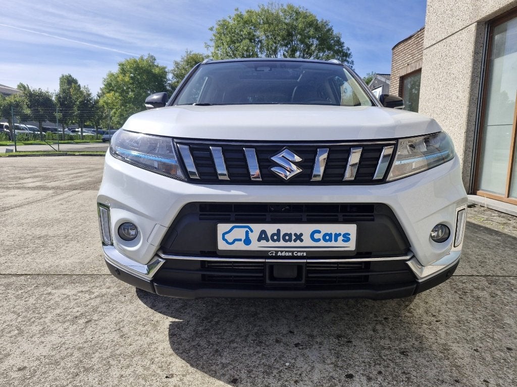Suzuki Vitara 1.4 Benzine 2022 / 1 Jaar Garantie, Auto's, Voorwielaandrijving, Stof, 4 cilinders, Wit