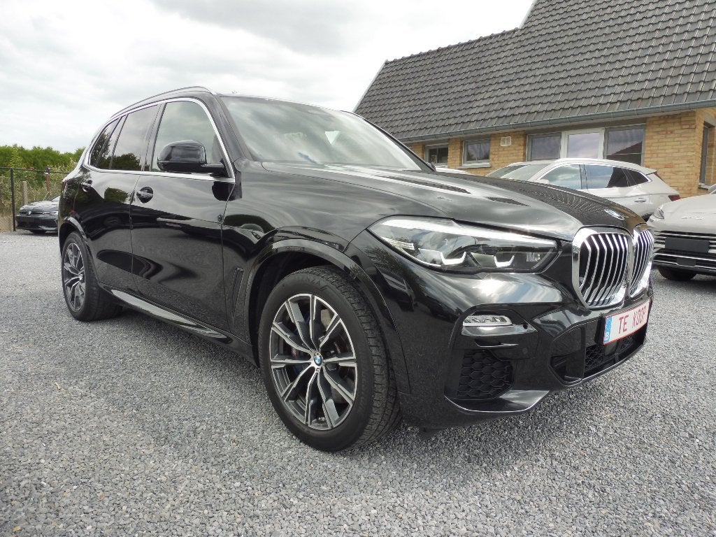 BMW X5 xDrive 45e M Pakket luchvering Laser 360 Camera zwart, Auto's, BMW, Dealer onderhouden, Lichtsensor, Zwart, Leder