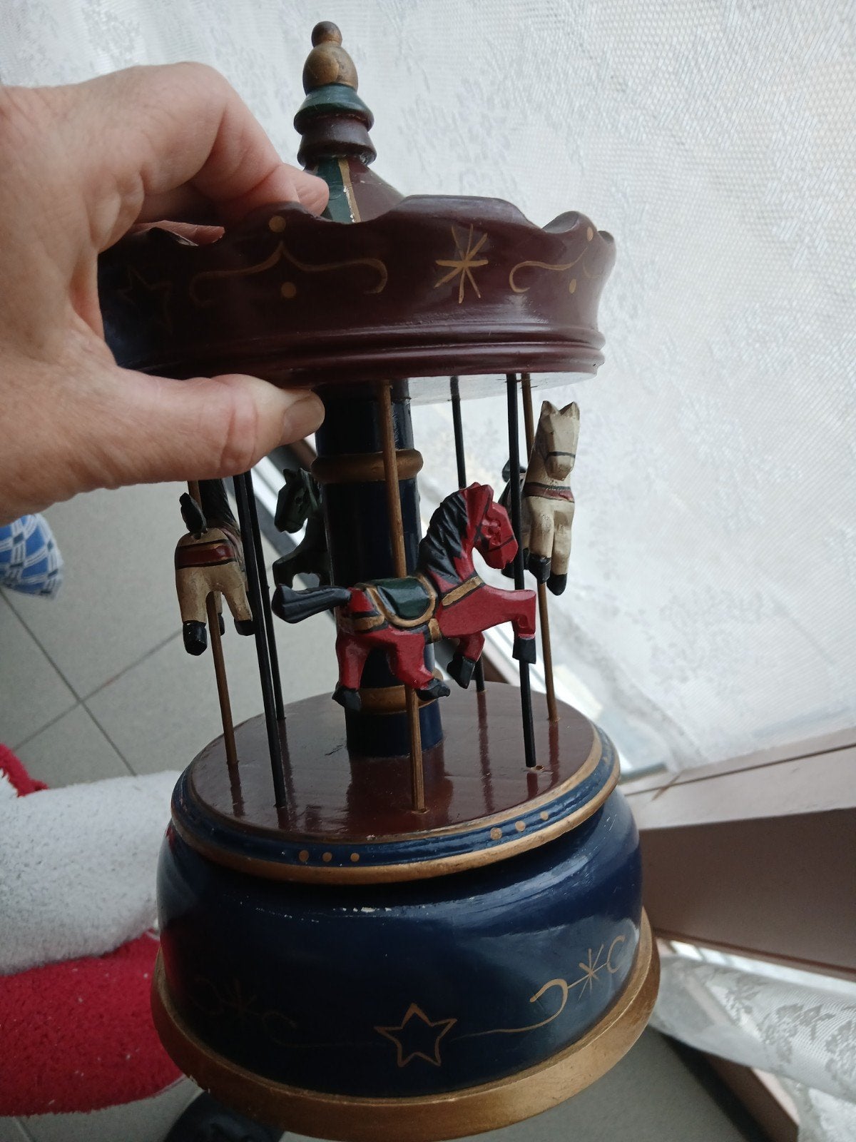 muziekdoos paardemolen antiek, Ophalen