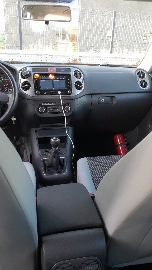 Volkswagen Tiguan noir 2011, Auto's, Voorwielaandrijving, Euro 5, Stof, Zwart