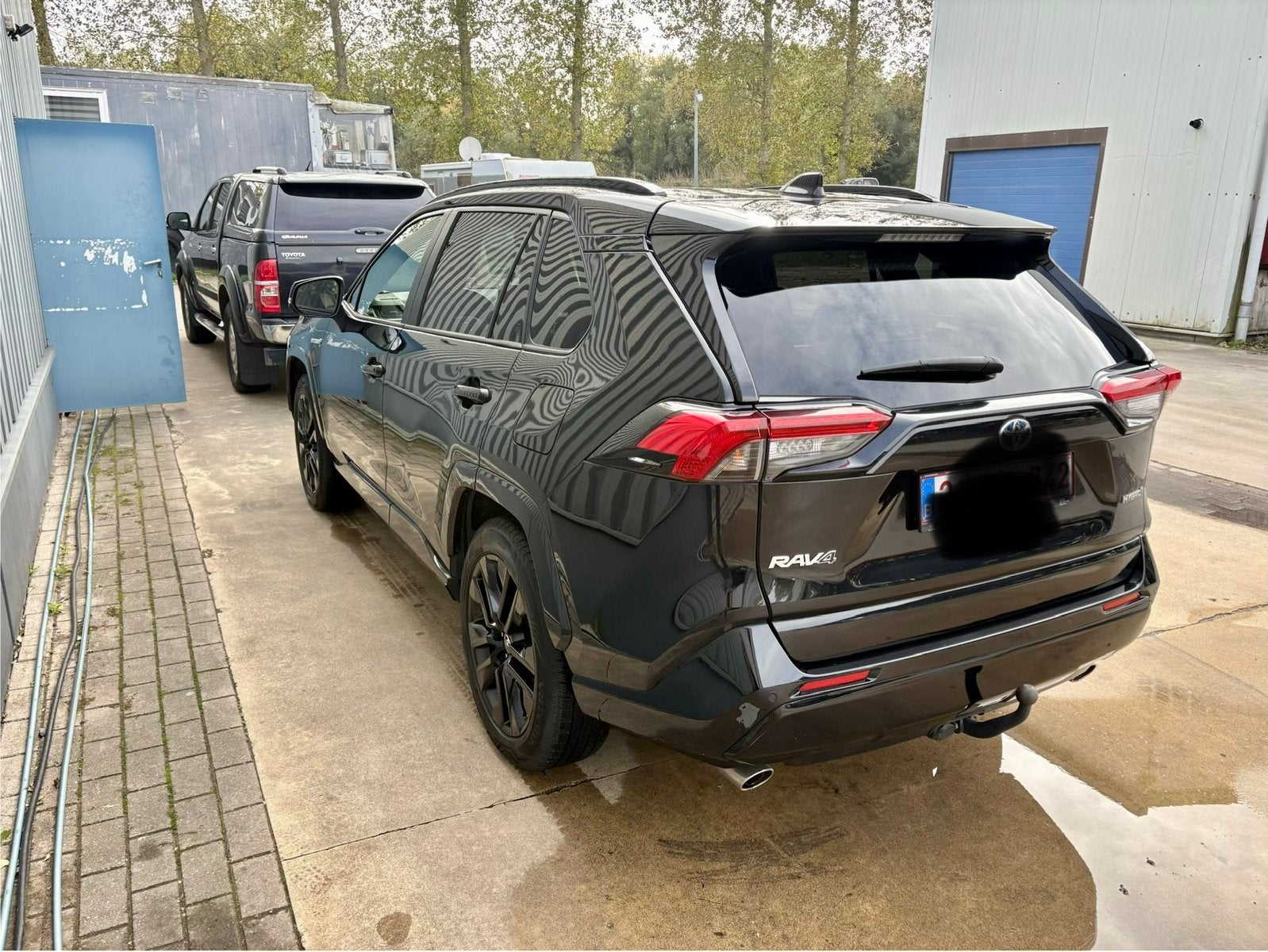 Toyota Rav4 2.5 hybride AWD Black Edition, Auto's, Automaat, Dealer onderhouden, 4 cilinders, 2487 cc